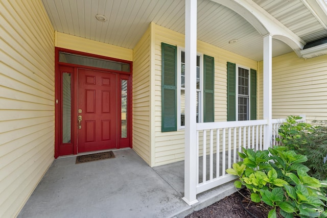 doorway to property with covered porch