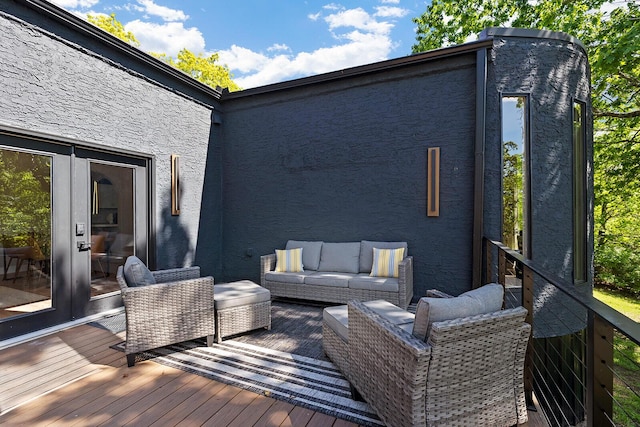 wooden deck featuring an outdoor living space