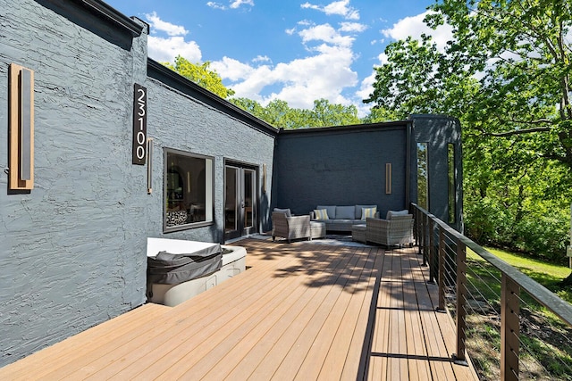 wooden deck with an outdoor hangout area