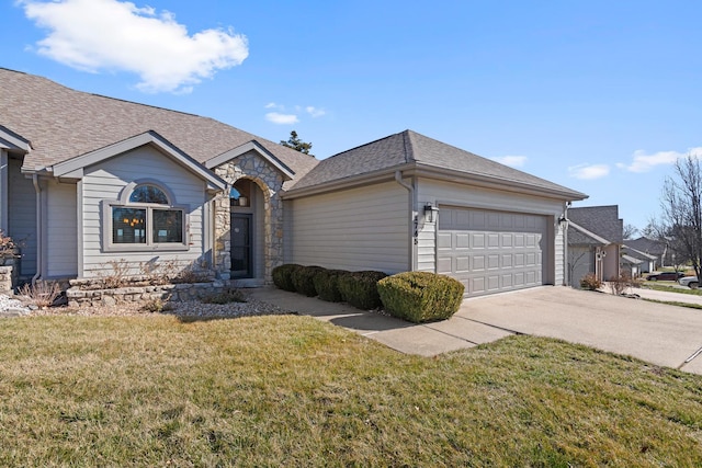 single story home with a garage, stone siding, driveway, roof with shingles, and a front yard