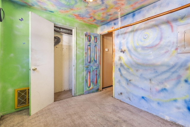 bedroom with carpet floors and visible vents