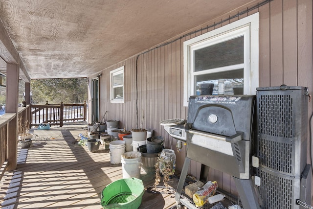 wooden deck with grilling area