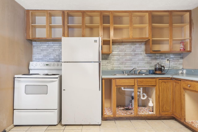 kitchen with white appliances, a sink, brown cabinets, open shelves, and tasteful backsplash