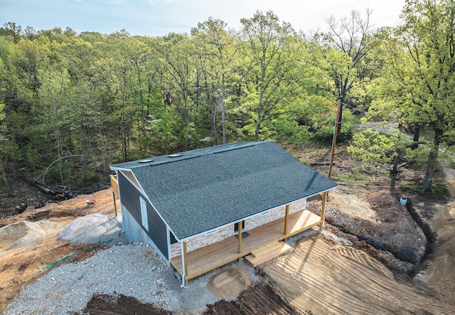 bird's eye view featuring a forest view
