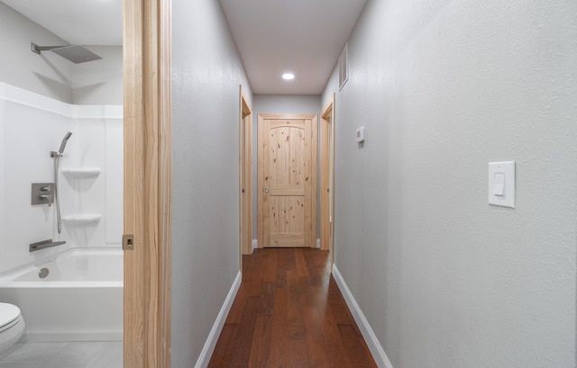 hall with baseboards, recessed lighting, and wood finished floors