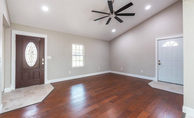 entryway with recessed lighting, wood-type flooring, high vaulted ceiling, a ceiling fan, and baseboards