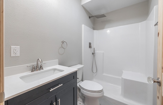 full bath with walk in shower, toilet, and vanity