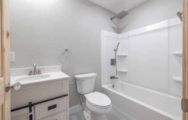 full bath with vanity, tile patterned floors, toilet, baseboards, and shower / washtub combination