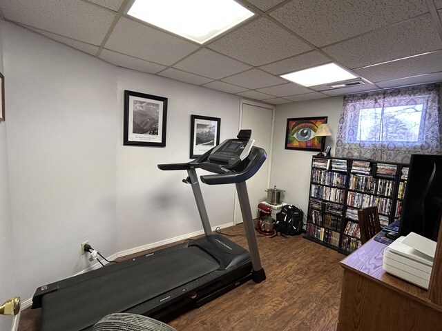 3894 Girlstown Rd, Mountain Grove, MO 65711 - workout room featuring wood finished floors, a drop ceiling, and baseboards