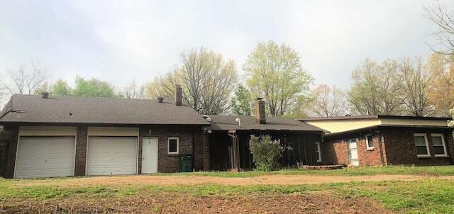 3894 Girlstown Rd, Mountain Grove, MO 65711 - view of front facade featuring brick siding, an attached garage, and a chimney