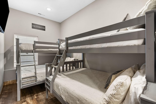 bedroom with wood finished floors, visible vents, and recessed lighting