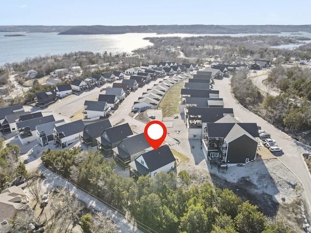 aerial view featuring a water view and a residential view