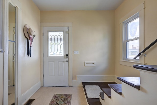 entryway featuring visible vents, plenty of natural light, and baseboards