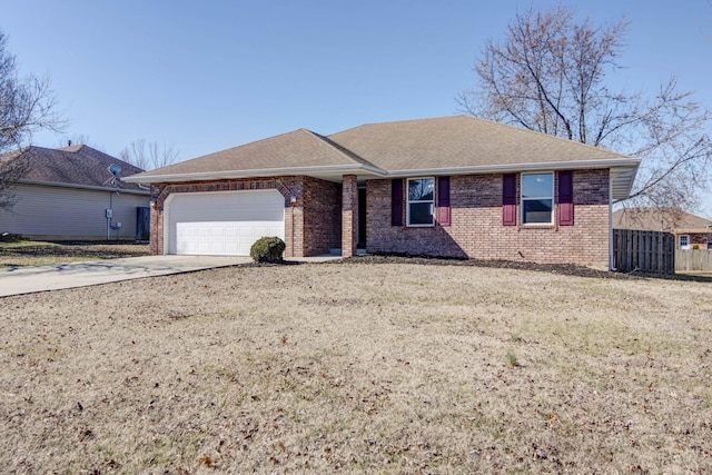 ranch-style house featuring driveway, a garage, roof with shingles, fence, and brick siding