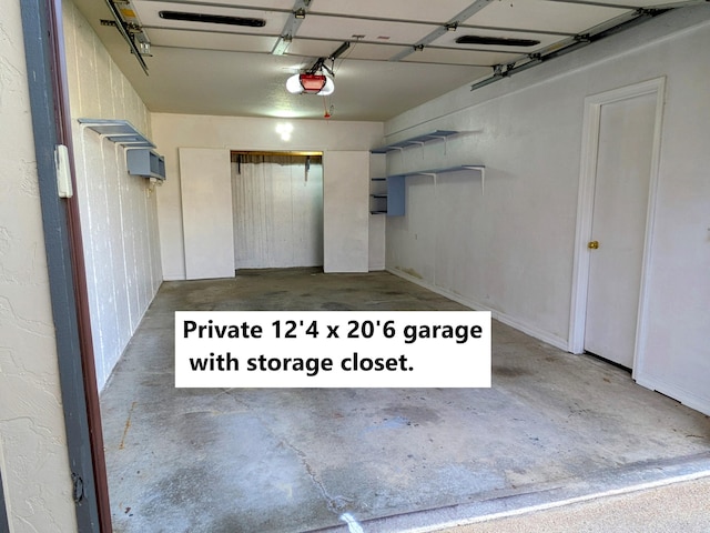 garage featuring a garage door opener