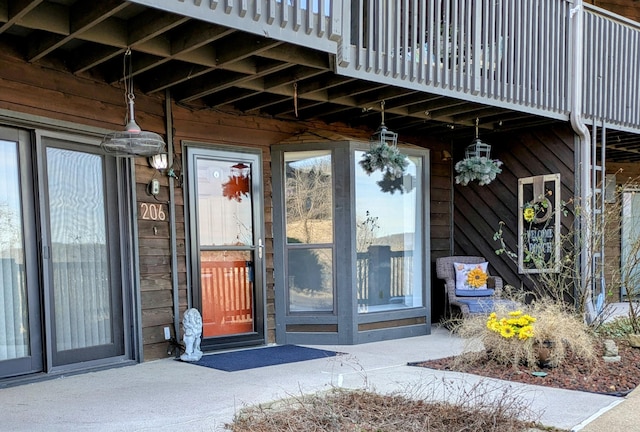 entrance to property featuring a balcony