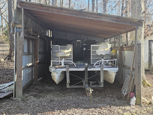 view of outbuilding featuring a carport