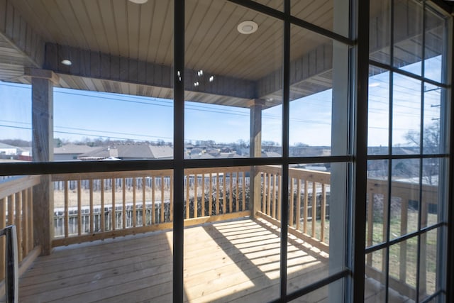 wooden deck with a city view