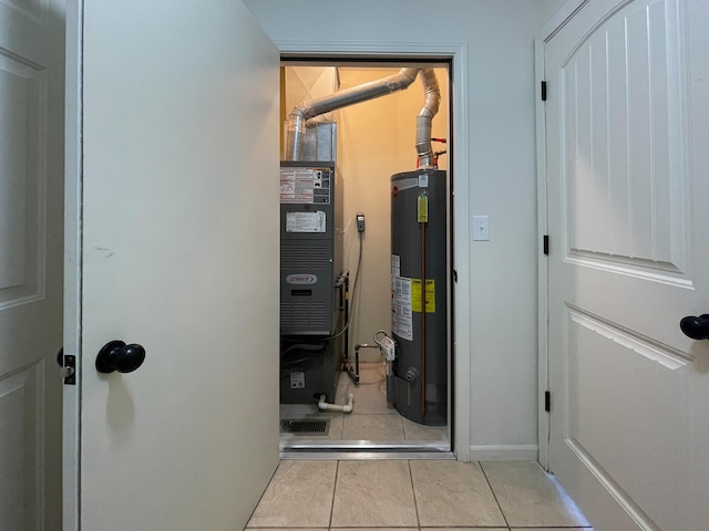 utility room with gas water heater