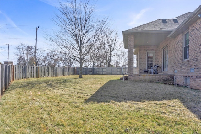 view of yard featuring a fenced backyard