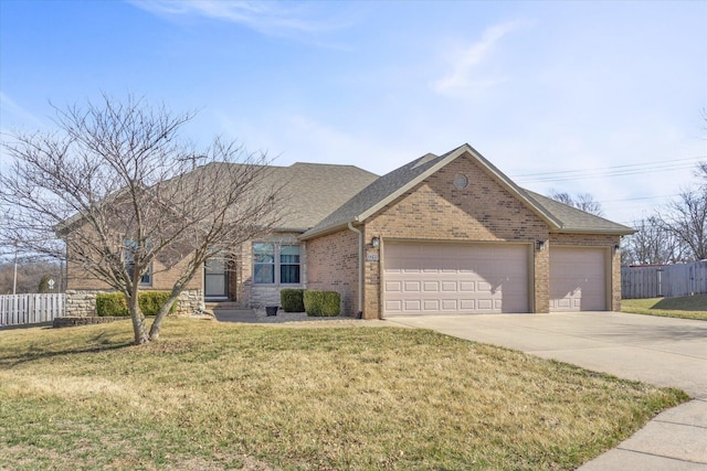 ranch-style house with concrete driveway, brick siding, a front yard, and fence