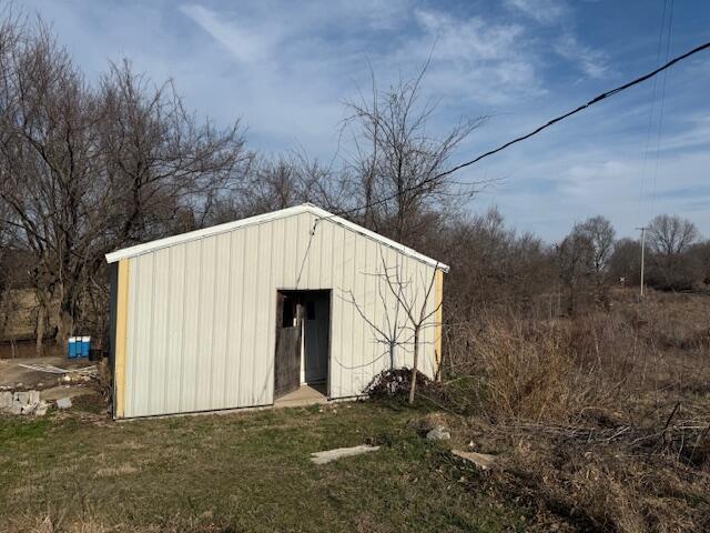 view of outbuilding with an outdoor structure