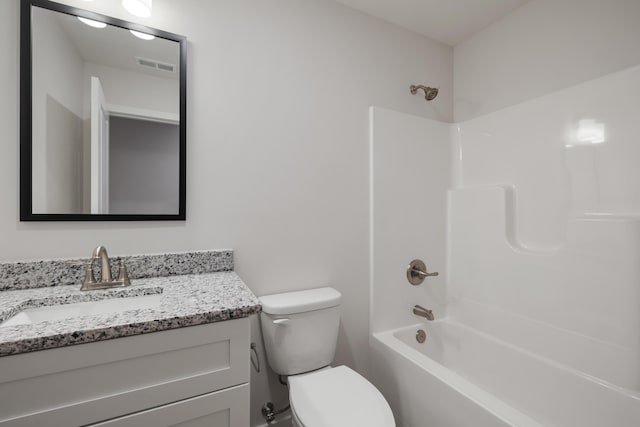 full bathroom with visible vents, toilet, vanity, and  shower combination