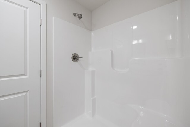 full bathroom with walk in shower