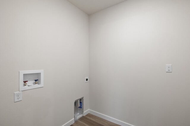 1756 Cash Dr, Mount Vernon, MO 65712 - washroom with dark wood-type flooring, baseboards, laundry area, hookup for a washing machine, and electric dryer hookup