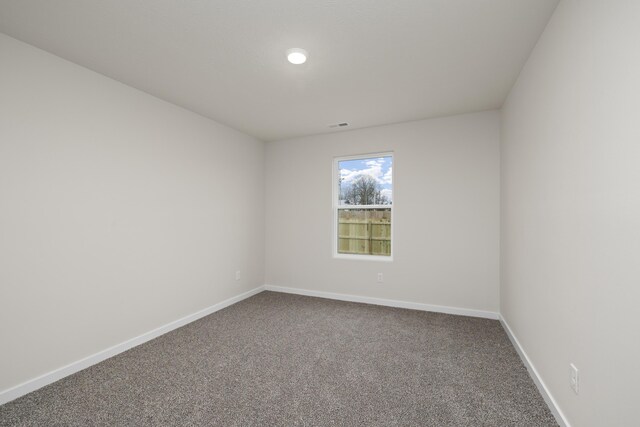 1756 Cash Dr, Mount Vernon, MO 65712 - empty room featuring visible vents, baseboards, and carpet flooring
