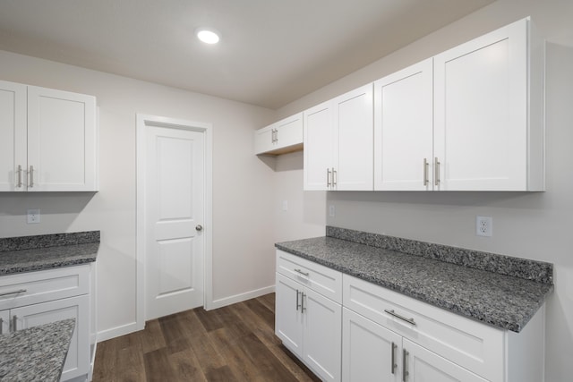 1756 Cash Dr, Mount Vernon, MO 65712 - kitchen featuring white cabinets, dark wood-style floors, and baseboards