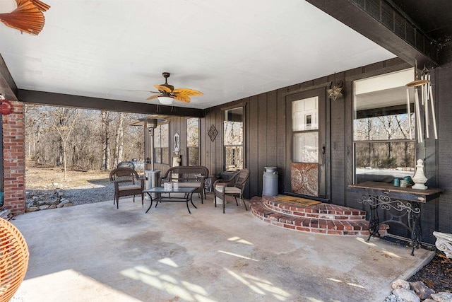 view of patio featuring a ceiling fan and an outdoor hangout area