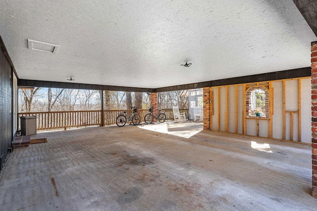 interior space featuring a textured ceiling