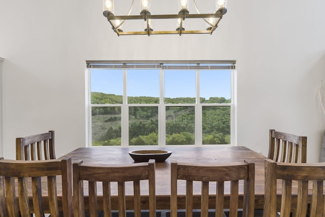 dining room featuring a notable chandelier