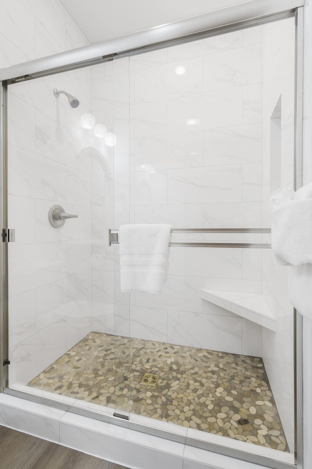 bathroom featuring a shower stall