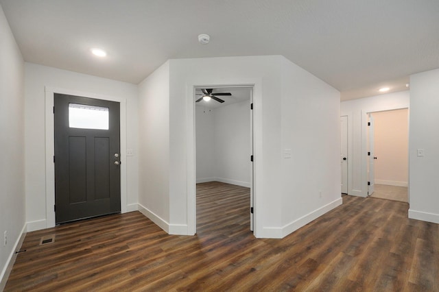 foyer entrance featuring dark wood-type flooring, recessed lighting, visible vents, and baseboards