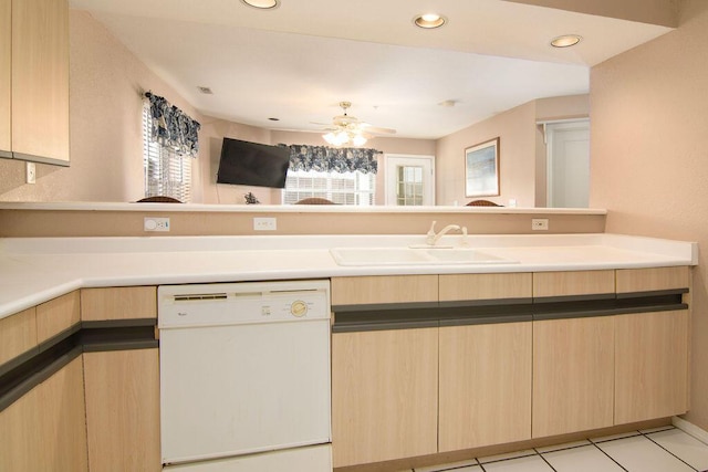 kitchen with white dishwasher, light brown cabinets, recessed lighting, a sink, and a ceiling fan