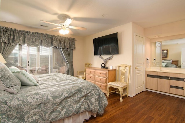 bedroom with dark wood-style floors, visible vents, and a ceiling fan