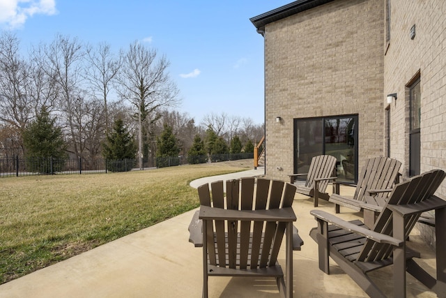 view of patio / terrace featuring fence