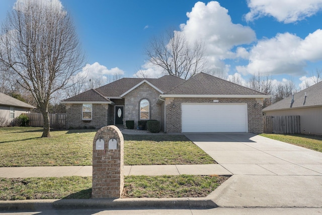 ranch-style house featuring a garage, a front yard, concrete driveway, and fence