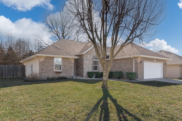 ranch-style home with a front yard, brick siding, fence, and an attached garage