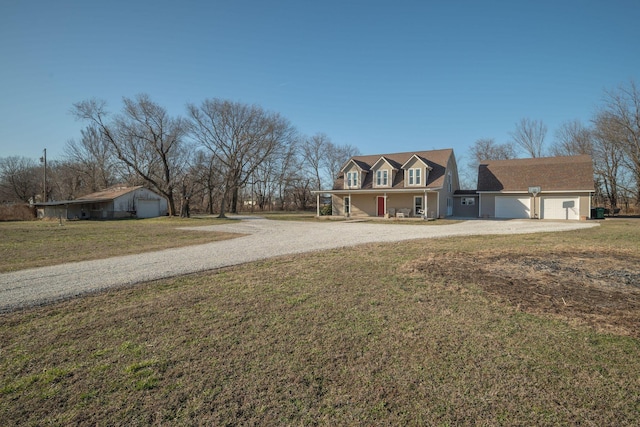 view of yard with gravel driveway