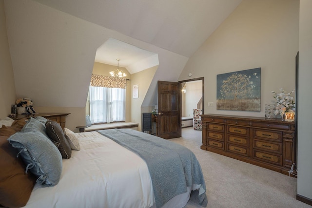 bedroom with a chandelier, light colored carpet, and vaulted ceiling