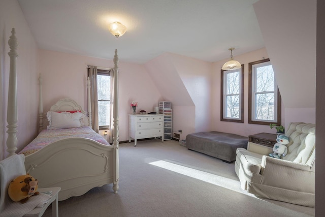 bedroom featuring light carpet and lofted ceiling