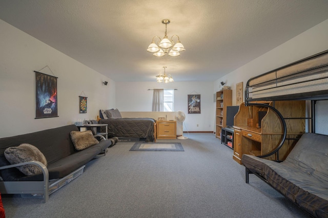 bedroom with a textured ceiling, carpet floors, baseboards, and a notable chandelier