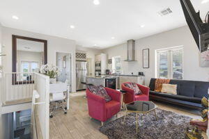 212 W Main St, Branson, MO 65616 - living room with light wood-type flooring, visible vents, and recessed lighting