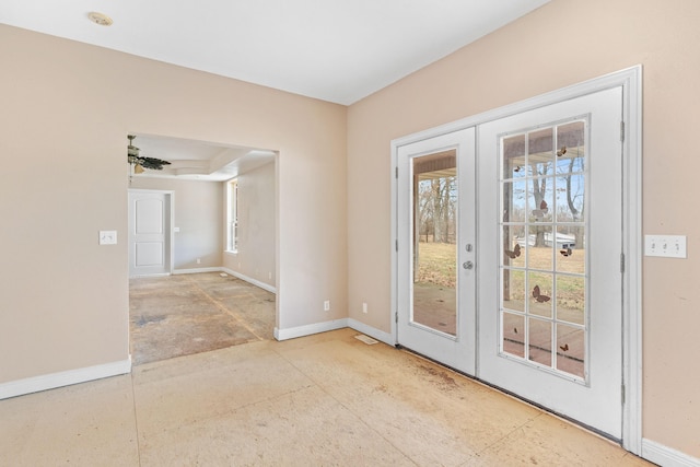 doorway to outside featuring french doors, a wealth of natural light, and baseboards