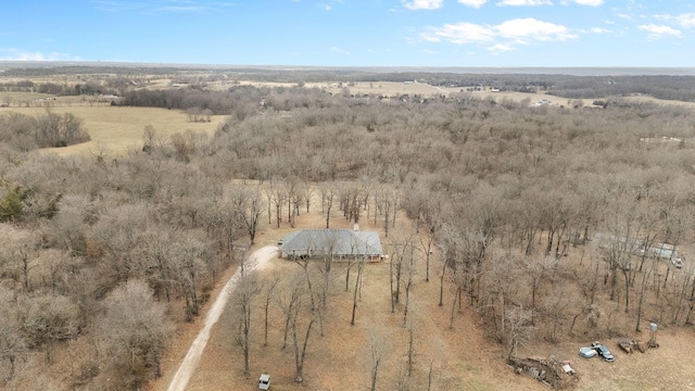 birds eye view of property with a rural view