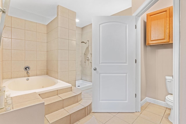 full bath featuring baseboards, tiled shower, toilet, tile patterned floors, and a garden tub