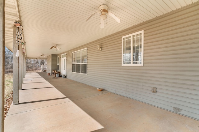 view of patio featuring a ceiling fan